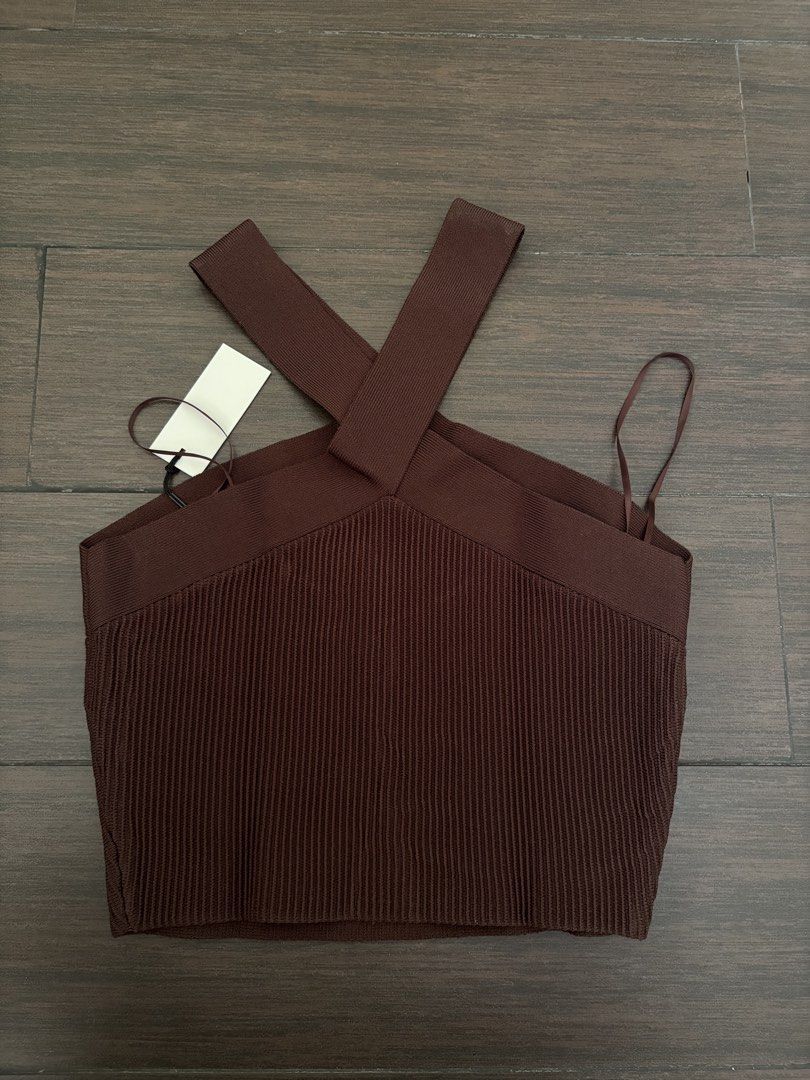 Aritzia Babaton ribbed knit cross halter top (Category: Sleeveless) located in Pasig City. Submitted by espressotonic14 (Listing ID 1430471262, Image 3). Description: BNWT Size M Color brown Bought in-store in NYC RFS: not being used .