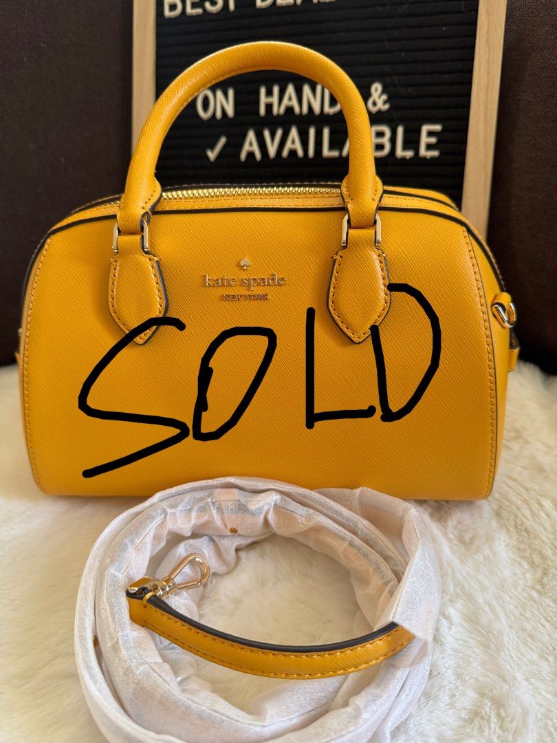 Authentic and brand new Kate Spade Duffle Bag (Category: Shoulder Bags) located in Paranaque City. Submitted by markkann (Listing ID 1380879165, Image 3). Description: For Sale!!!! Original, brand new, on hand Kate Spade Madison Safiano leather duffle bag Gold Hardware with detacheable sling 2-way bag - handbag and sling bag Purchased from California, USA.