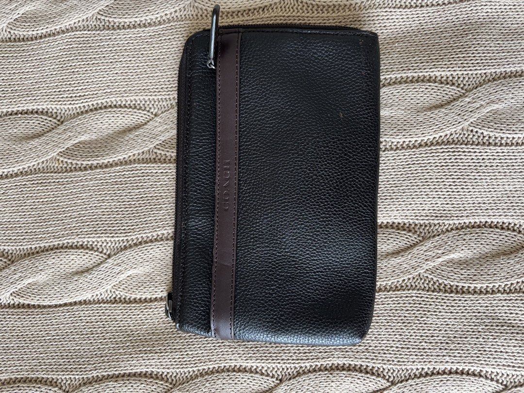 Authentic Coach Dark Brown Pouch (Category: Wallets & Card holders) located in Manila. Submitted by morimarche (Listing ID 1430468013, Image 1). Description: ✔️ Authentic ✔️ Heavily used ✔️ Still usable 💡 Good as organizer or casual use ❗ Visible signs of wear .