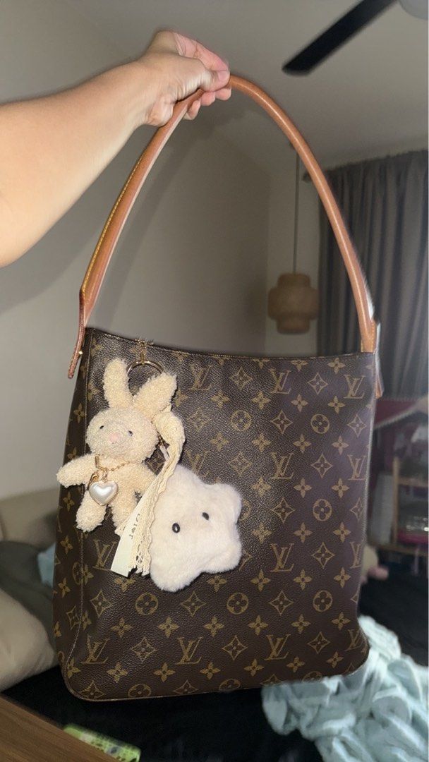 Authentic Louis Vuitton Looping GM Shoulder Bag (Category: Luxury Bags & Wallets) located in Quezon City. Submitted by heymumaddie (Listing ID 1430475789, Image 1). Description: One of my personal faves and honestly hard to find! ✨ • Monogram canvas with vachetta strap • Lightly used, very good condition • Vibrant monogram, shiny hardware, clean interior • Comes with original dust bag 💯 Size: 11.8” L × 11” W × 3.9” D Still negotiable, PM me your
