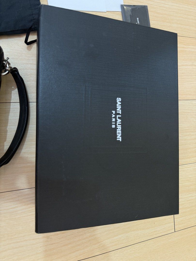Authentic Saint Laurent College Medium Bag (Category: Luxury Bags & Wallets) located in Paranaque City. Submitted by declutterwithjoy (Listing ID 1430412809, Image 3). Description: Please no low baller. Posted issues at the back of the bag. Inclusion: Entrupy Cert, Box, Dust Bag For sure buyer, meetup at SM Bicutan or SM BF RFS: Will buy new bag Grab Express (No Lalamove) Location: Paranaque City.