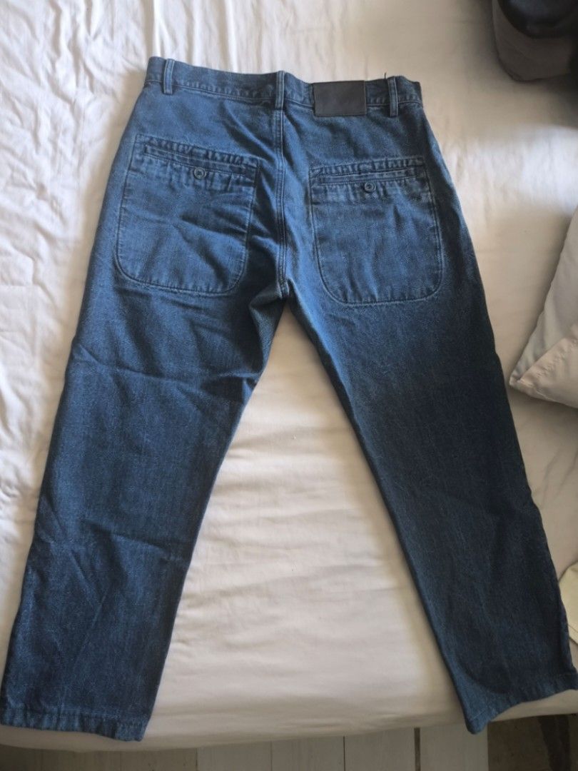 Bleu de Paname Jeans (Category: Jeans) located in Pavia. Submitted by deusk (Listing ID 1430433490, Image 2). Description: Authentic Bleu de Paname jeans in size 32. Features a button fly and two back pockets. The jeans are a classic blue denim wash. The tag indicates they are manufactured in France. Heritage Workwear work wear.