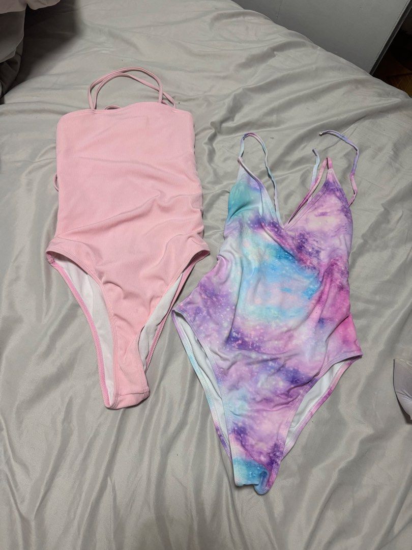 Bundle crossback one piece bikini (Category: Bikinis & Swimsuits) located in Manila. Submitted by dejunk.mnl (Listing ID 1430534451, Image 1). Description: In good condition. Yung pastel purple/pink swimsuit, nag loose yung tali. But di naman na affect yung design..