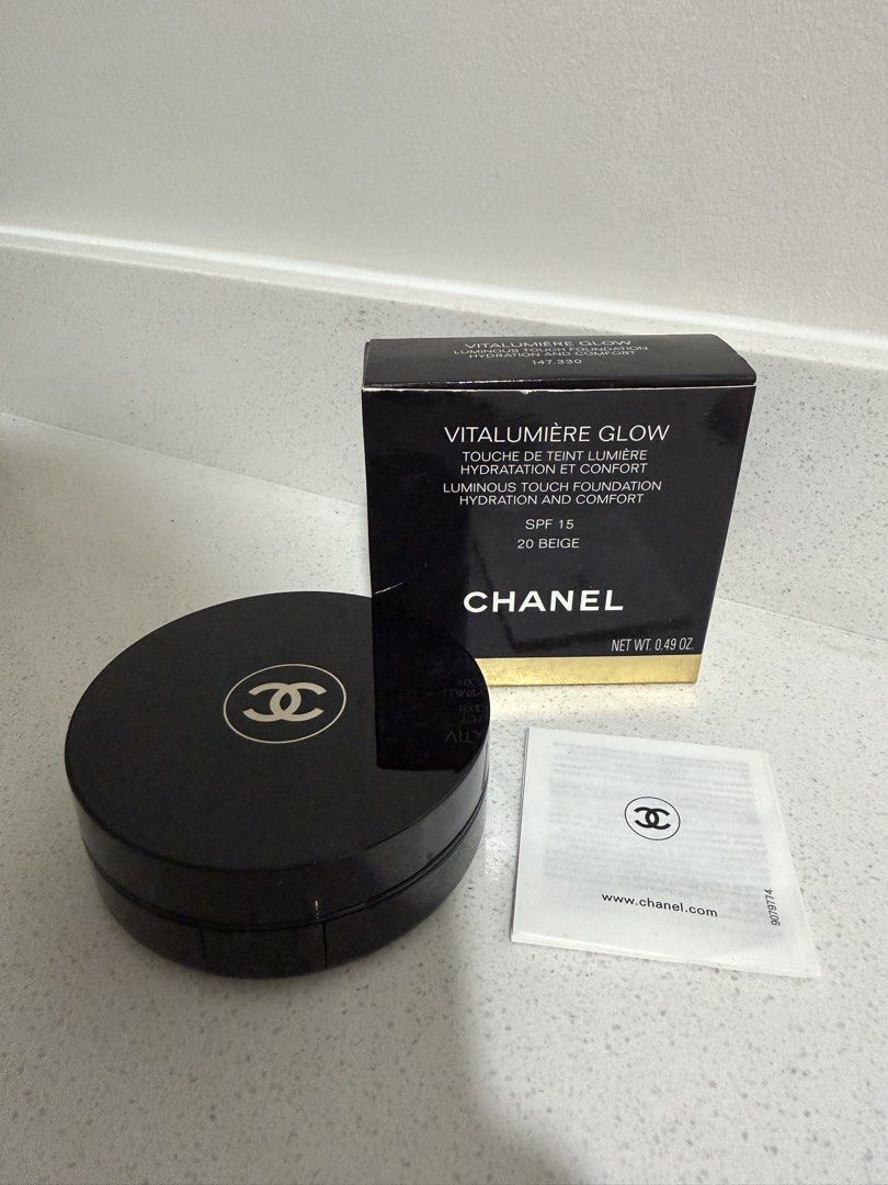 Chanel Vitalumiere Glow Foundation SPF 15 (Category: Makeup) located in Cainta. Submitted by mycosy.life (Listing ID 1430516639, Image 1). Description: Luxury makeup! Hard to find! Chanel Vitalumiere Glow foundation in 20 Beige. This foundation provides luminous touch hydration and comfort. The box includes the foundation compact, the original box, and an information leaflet. The price tag from Rustan's is still attached, showing the original pri