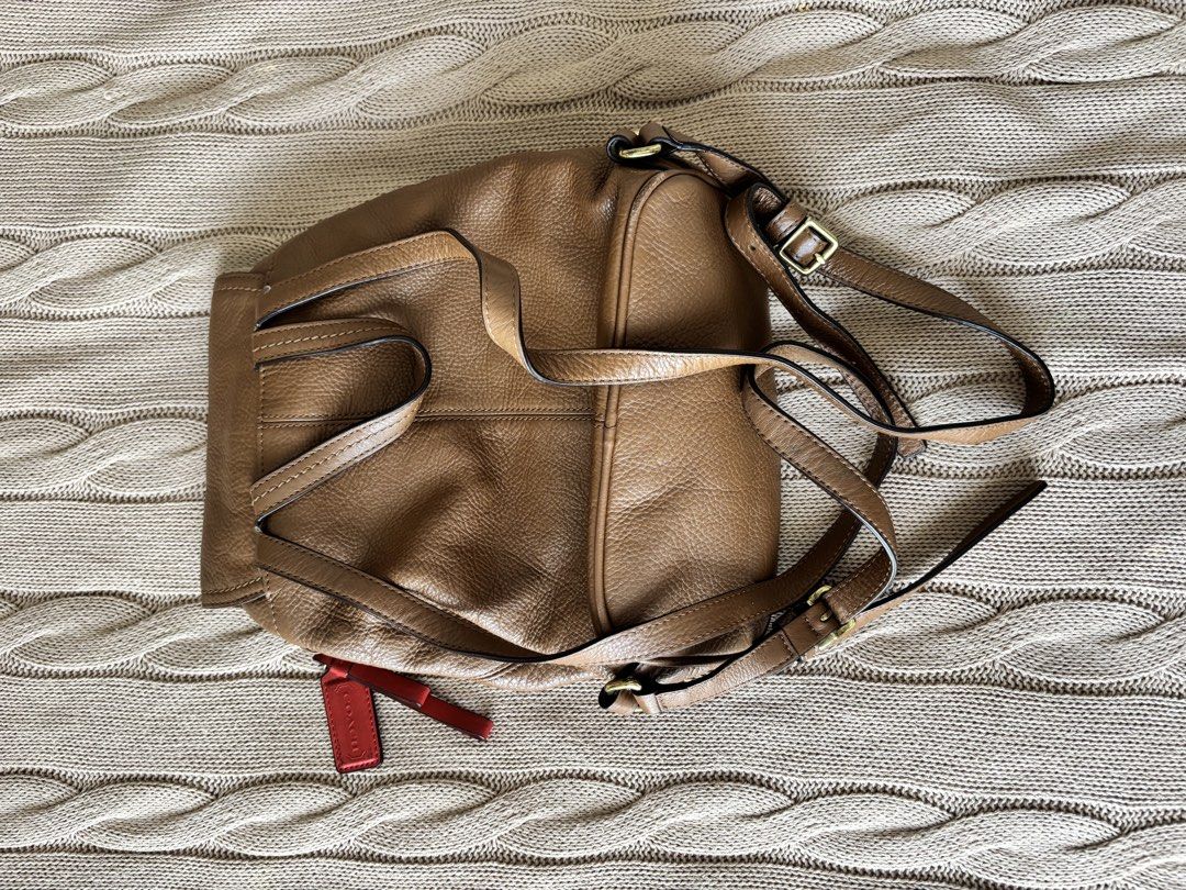 Coach Leather Drawstring Backpack (Category: Backpacks) located in Manila. Submitted by morimarche (Listing ID 1430468357, Image 2). Description: ✔️ Authentic (Code: F24385) ✔️ Bought in the US ✔️ Slight tear on strap Still usable or can be repaired. 💡 Good deal for original Coach.
