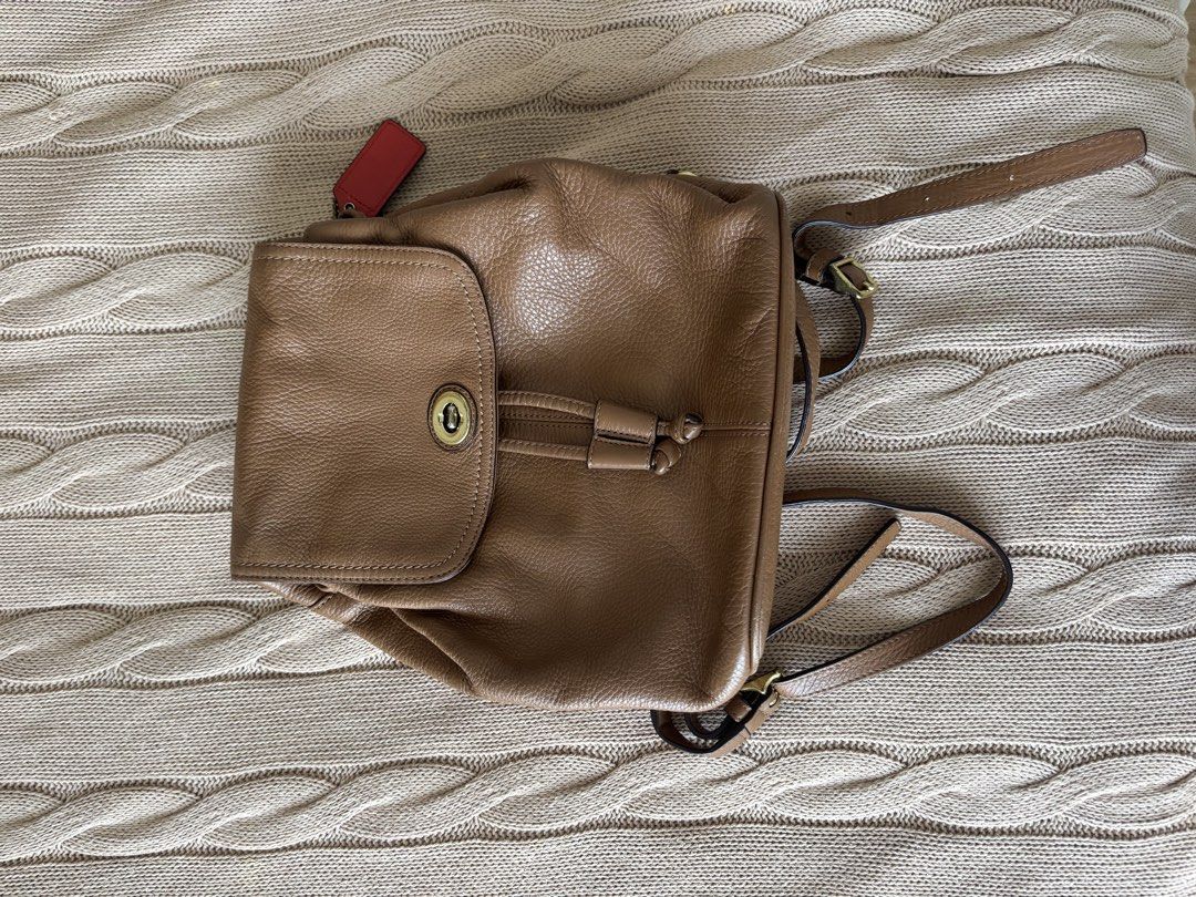 Coach Leather Drawstring Backpack (Category: Backpacks) located in Manila. Submitted by morimarche (Listing ID 1430468357, Image 1). Description: ✔️ Authentic (Code: F24385) ✔️ Bought in the US ✔️ Slight tear on strap Still usable or can be repaired. 💡 Good deal for original Coach.