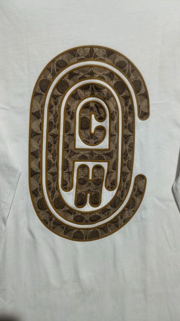 Coach Long Sleeve T-Shirt (Category: Tshirts & Polo Shirts ) located in Manila. Submitted by bapthrift (Listing ID 1430480545, Image 2). Description: White long sleeve Coach t-shirt. Features a large Coach logo on the front and the Coach logo on the sleeve. Made in Peru. Size Small fits to Medium. Made of 100% cotton. 400+shipping.
