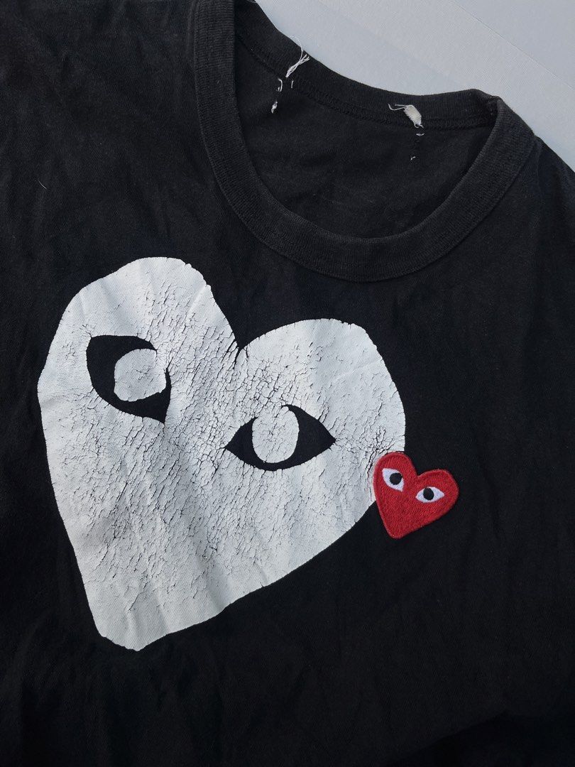 Comme des Garcons Play Heart Logo Tee (Category: Shirts) located in Mabalacat. Submitted by aas_thriftfings (Listing ID 1430506322, Image 2). Description: - Comme des Garcons Play Heart Logo Tee - Size: S - Color: Black - Features the iconic heart logo.