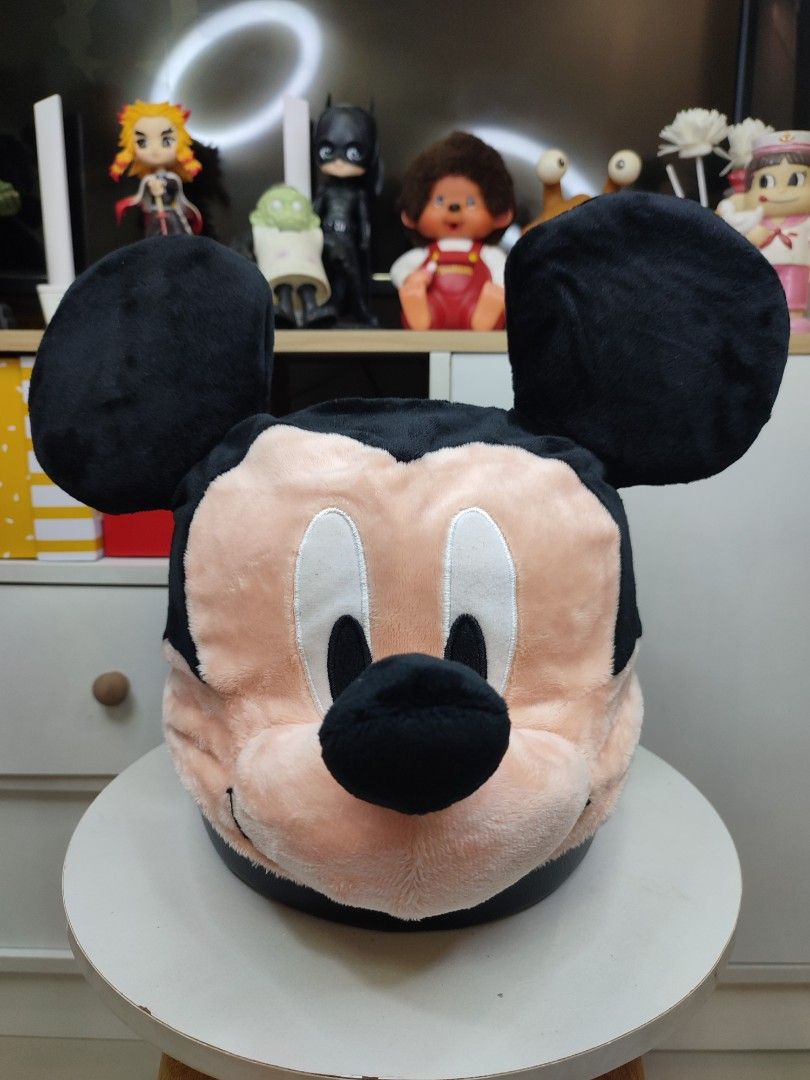 Disney Mickey Mouse Hat (Category: Caps & Hats) located in Manila. Submitted by epicmountain-f20453 (Listing ID 1430437126, Image 1). Description: Mickey Mouse hat. It features Mickey's face on the front, with his ears on top. The hat has a black exterior and a yellow interior. The tag indicates it is an adult size..