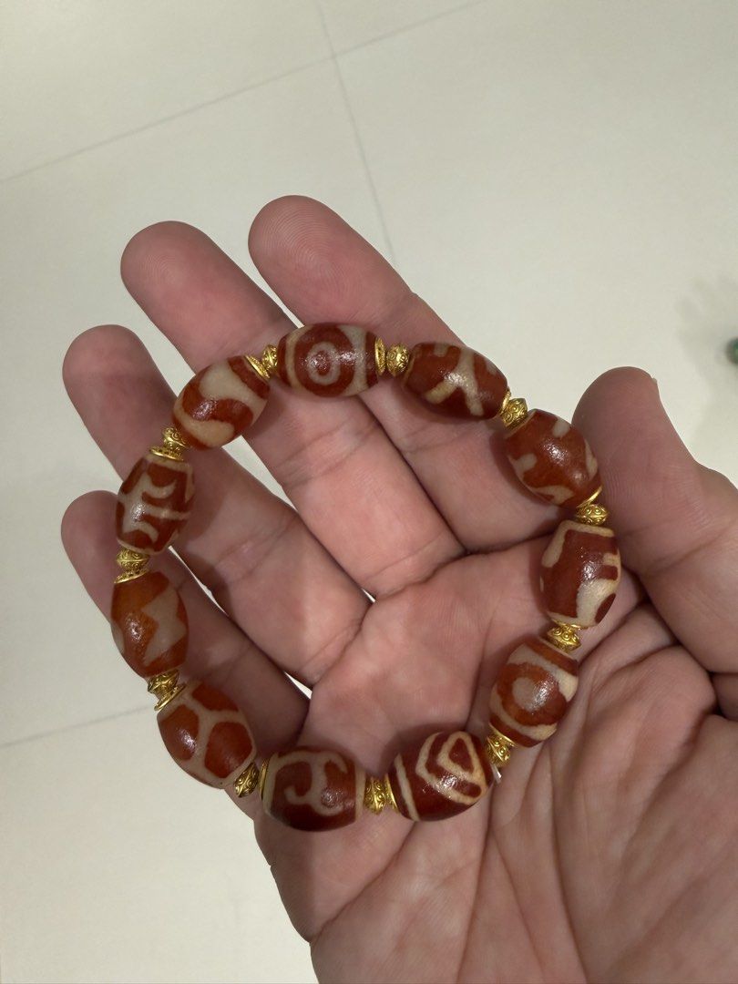 dzi beads (Category: Bracelets) located in Singapore. Submitted by aydanah (Listing ID 1430540708, Image 1). Description: Tian Zhu worn once 红肉天珠.