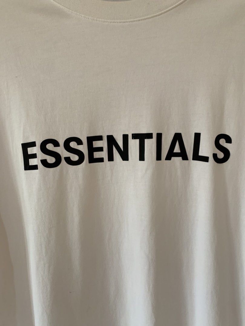 Fear of God Essentials White T-shirt (Category: Tshirts & Polo Shirts ) located in Baler. Submitted by boondocks.thrift (Listing ID 1430410081, Image 2). Description: Dimensions: Length: 30 Width: 23 Color rate: 9/10 Condition: 8/10 Issue: Stains, Broken Embossed Print, Need Wash Claim: ₱300 Dm to purchase #BoondocksAvailable.