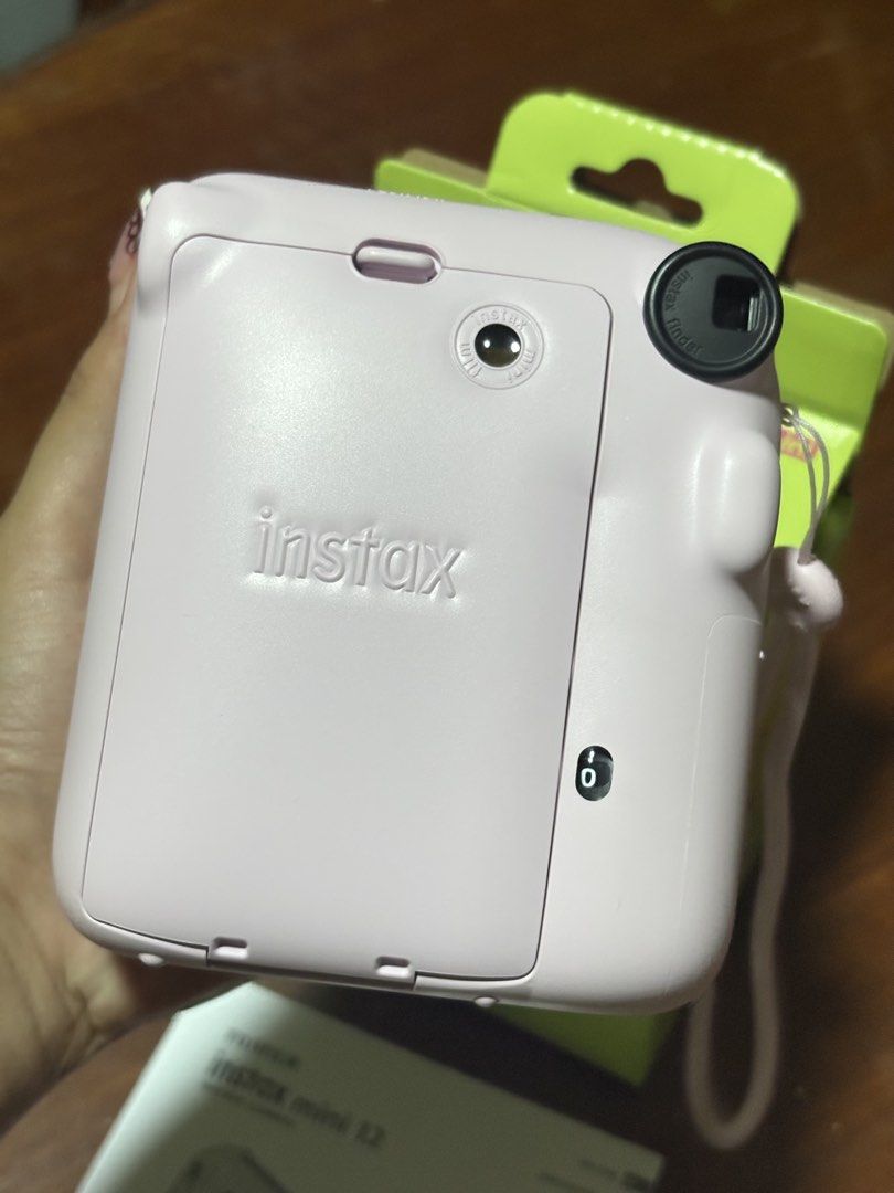 Fujifilm Instax Mini 12 Instant Camera (Category: Cameras) located in Manila. Submitted by junioangel61287 (Listing ID 1430521212, Image 2). Description: FOR SALE: Instax Mini 12 (Barely Used) Purchased just last Feb 2026. Everything is working perfectly—no scratches, no hidden issues. RFS: : Upgrading or Not being used Meetup at sm baliuag or via lalamove. DM for inquiries! 📩.