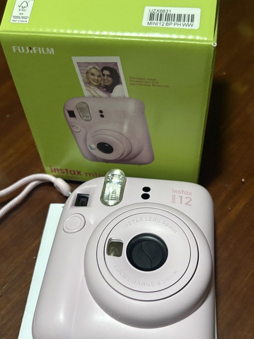 Fujifilm Instax Mini 12 Instant Camera (Category: Cameras) located in Manila. Submitted by junioangel61287 (Listing ID 1430521212, Image 3). Description: FOR SALE: Instax Mini 12 (Barely Used) Purchased just last Feb 2026. Everything is working perfectly—no scratches, no hidden issues. RFS: : Upgrading or Not being used Meetup at sm baliuag or via lalamove. DM for inquiries! 📩.