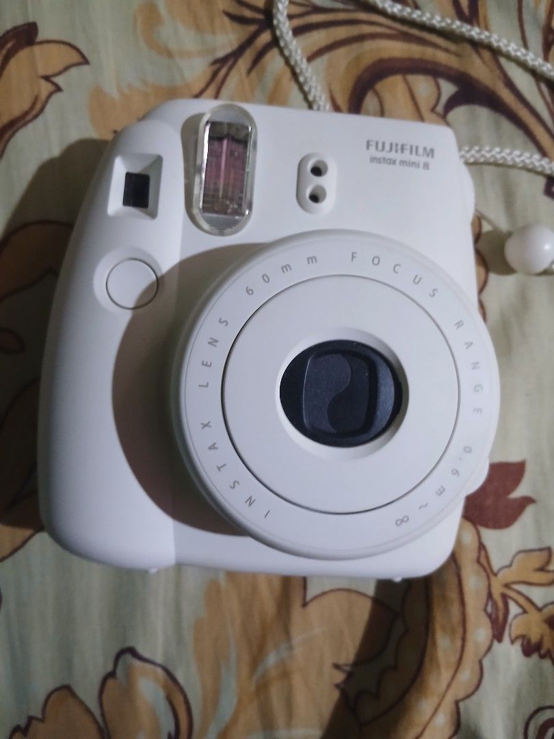 Fujifilm Instax mini 8 (Category: Cameras) located in Manila. Submitted by rykerson (Listing ID 1430574983, Image 1). Description: Rush sale (Not sure if it's still working, but if you're a sure buyer I would immediately give it to you.) Reason: need money for allowance No batteries & film Loc: Fishermall.