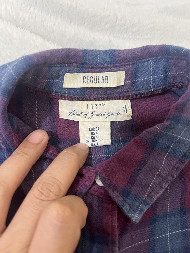 H&M Polo plaid oversized longsleeve (Category: Longsleeves) located in Pasig City. Submitted by mr.abrenica (Listing ID 1430521556, Image 3). Description: Decluttering Sale! H&M Polo Plaid design, oversized longsleeves in purple and burgundy color. Size: Small on tag Used condition, no issues, washed already, ready to wear Payment:gcash Shipping: Any preffered by the buyer #Casualpolo#PlaidPolo#CheckeredPolo# H&M#Forever21#Zara.