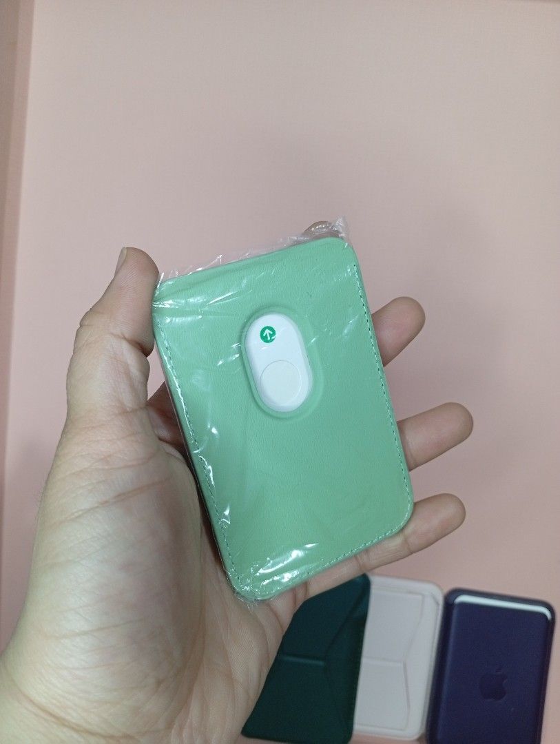 Iphone MagSafe (Category: Mounts & Holders) located in Makati City. Submitted by vians2002 (Listing ID 1430587535, Image 3). Description: Take all at 650!!! Key Features: 2-in-1 Design: It functions as a slim card holder that can store 2-3 cards and folds out into a multi-angle phone stand. MagSafe Compatible: It attaches via built-in magnets to the back of iPhone 12 through iPhone 16/17 models or compatible magnetic cases. Versatile Stand: The u