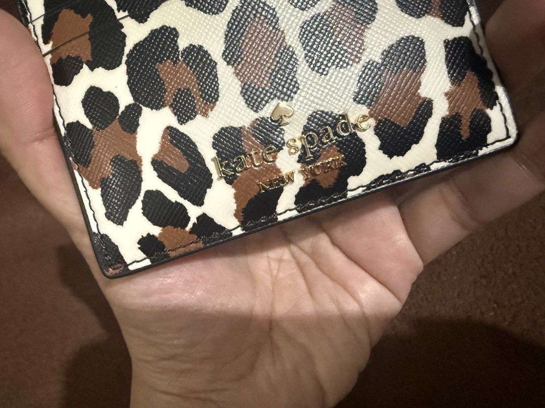 Kate Spade Madison spotted Leopard Small Slim card holder (Category: Luxury Bags & Wallets) located in Quezon City. Submitted by andanel16 (Listing ID 1430463337, Image 3). Description: Kate Spade Madison spotted Leopard Small Slim card holder Condition: Brand New Price: ₱2,200 ✔ 100% Original ✔ From US ✔ No box .