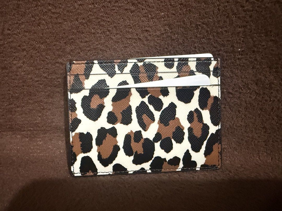 Kate Spade Madison spotted Leopard Small Slim card holder (Category: Luxury Bags & Wallets) located in Quezon City. Submitted by andanel16 (Listing ID 1430463337, Image 2). Description: Kate Spade Madison spotted Leopard Small Slim card holder Condition: Brand New Price: ₱2,200 ✔ 100% Original ✔ From US ✔ No box .