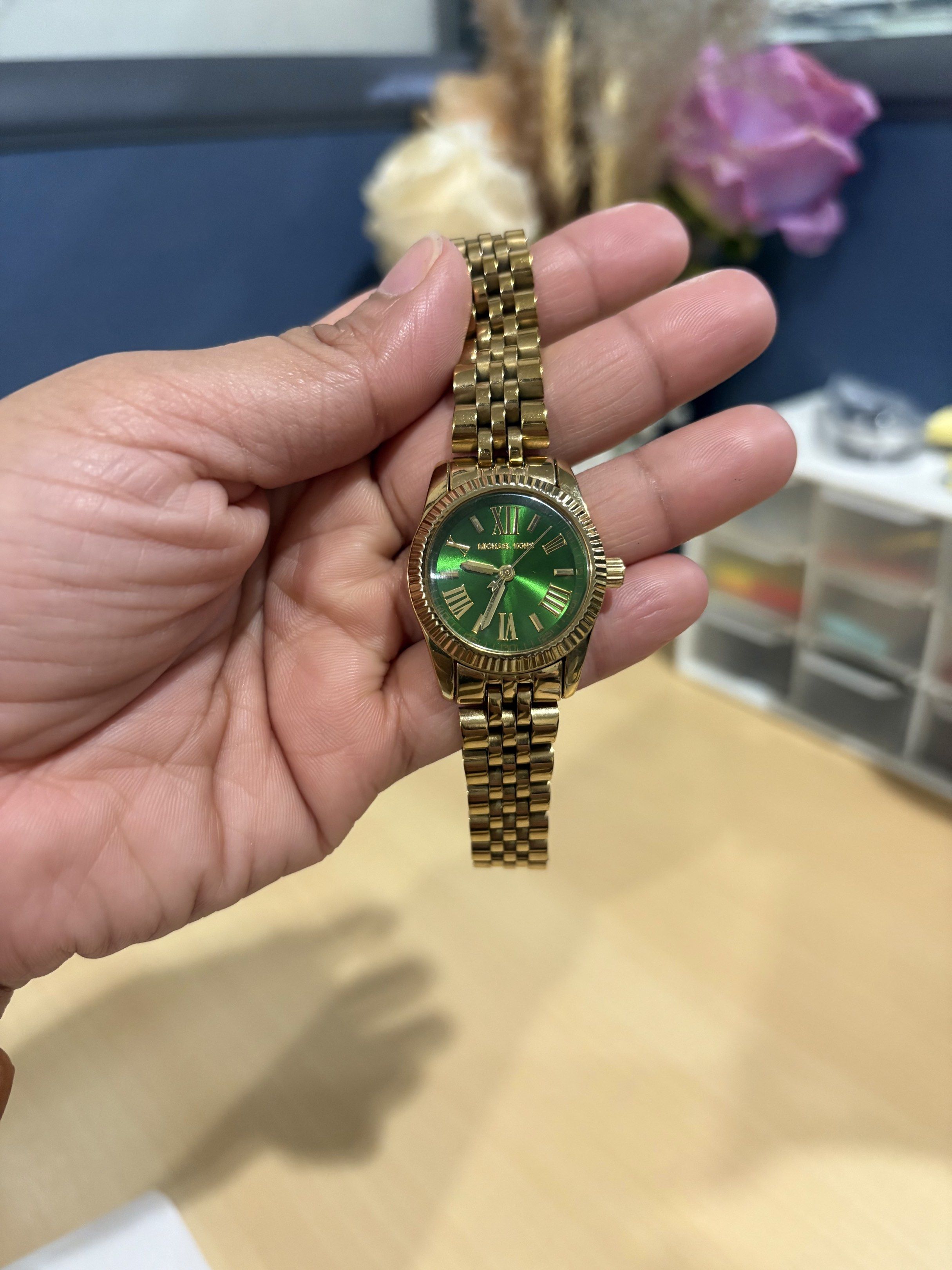 Michael Kors Gold Watch with Green Dial (Category: Women's Watches) located in Quezon City. Submitted by cesscstr (Listing ID 1430413596, Image 2). Description: Original MK women’s gold watch. Can be adjusted. Ps. No box, only watch. .