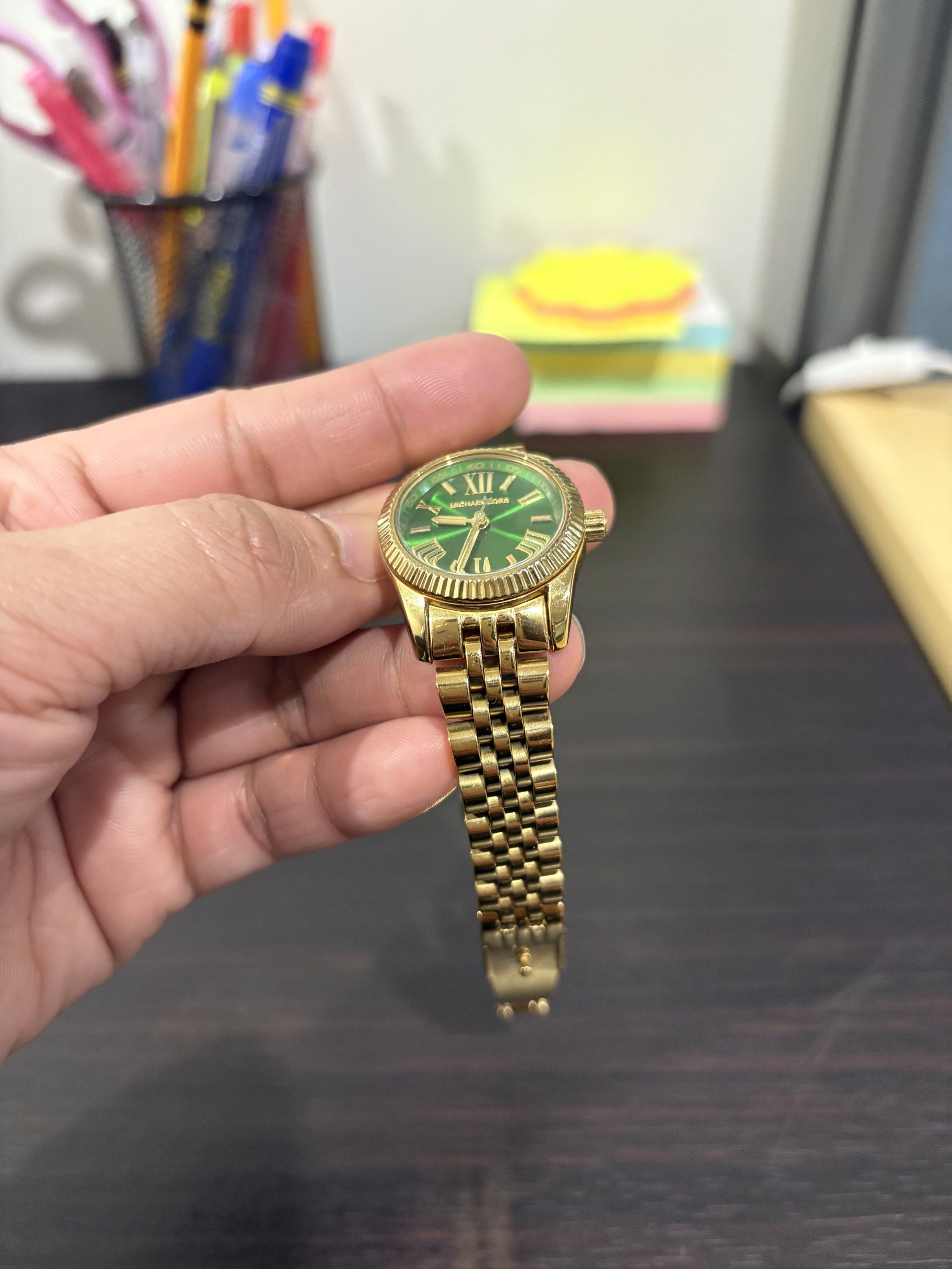 Michael Kors Gold Watch with Green Dial (Category: Women's Watches) located in Quezon City. Submitted by cesscstr (Listing ID 1430413596, Image 3). Description: Original MK women’s gold watch. Can be adjusted. Ps. No box, only watch. .