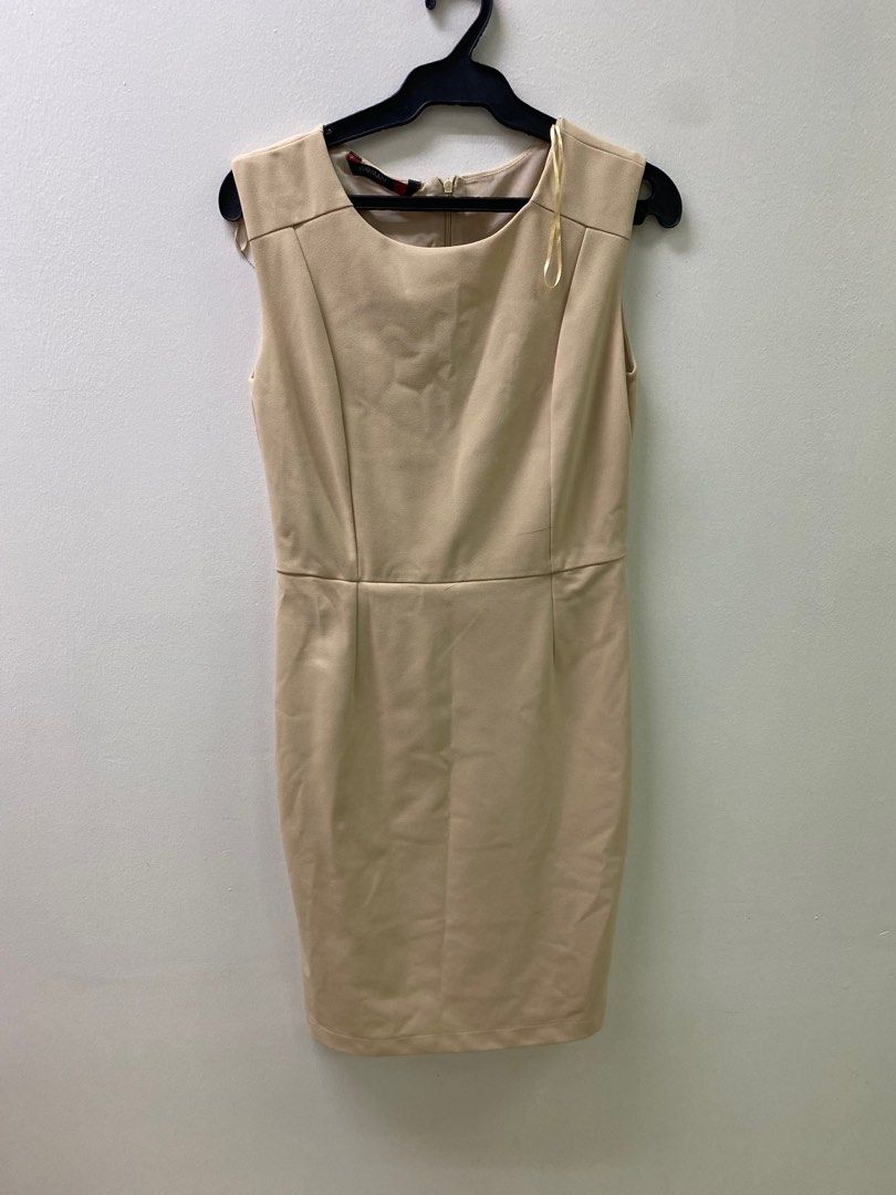 Beige Women Dress -Medium (Category: Dresses) located in Manila. Submitted by nallazaid (Listing ID 1430432824, Image 1). Description: women dress- still in very good condition mediun: 27-28” waistline and stretchable Women as tag..