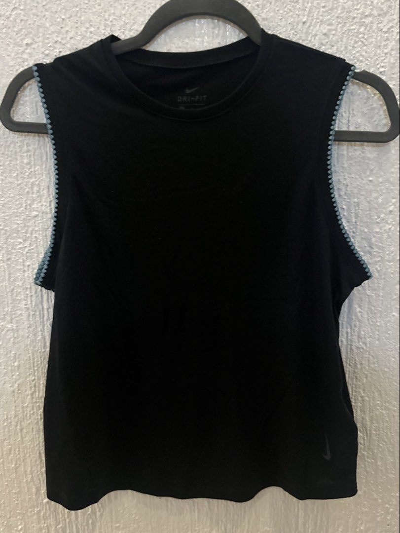 Nike Black Yoga Tank Top (Category: Activewear) located in Muntinlupa City. Submitted by mykaroms (Listing ID 1430562622, Image 1). Description: Nike Black Yoga Tank Top With blue thread details on the sleeve area Super lightweight drifit material Size Women's L (fits me a bit loose, I'm usually a size Women's M) No low ballers. Slight discount can be given if multiple items are purchased Gcash Payment. Delivery via Gogoxpress only. .