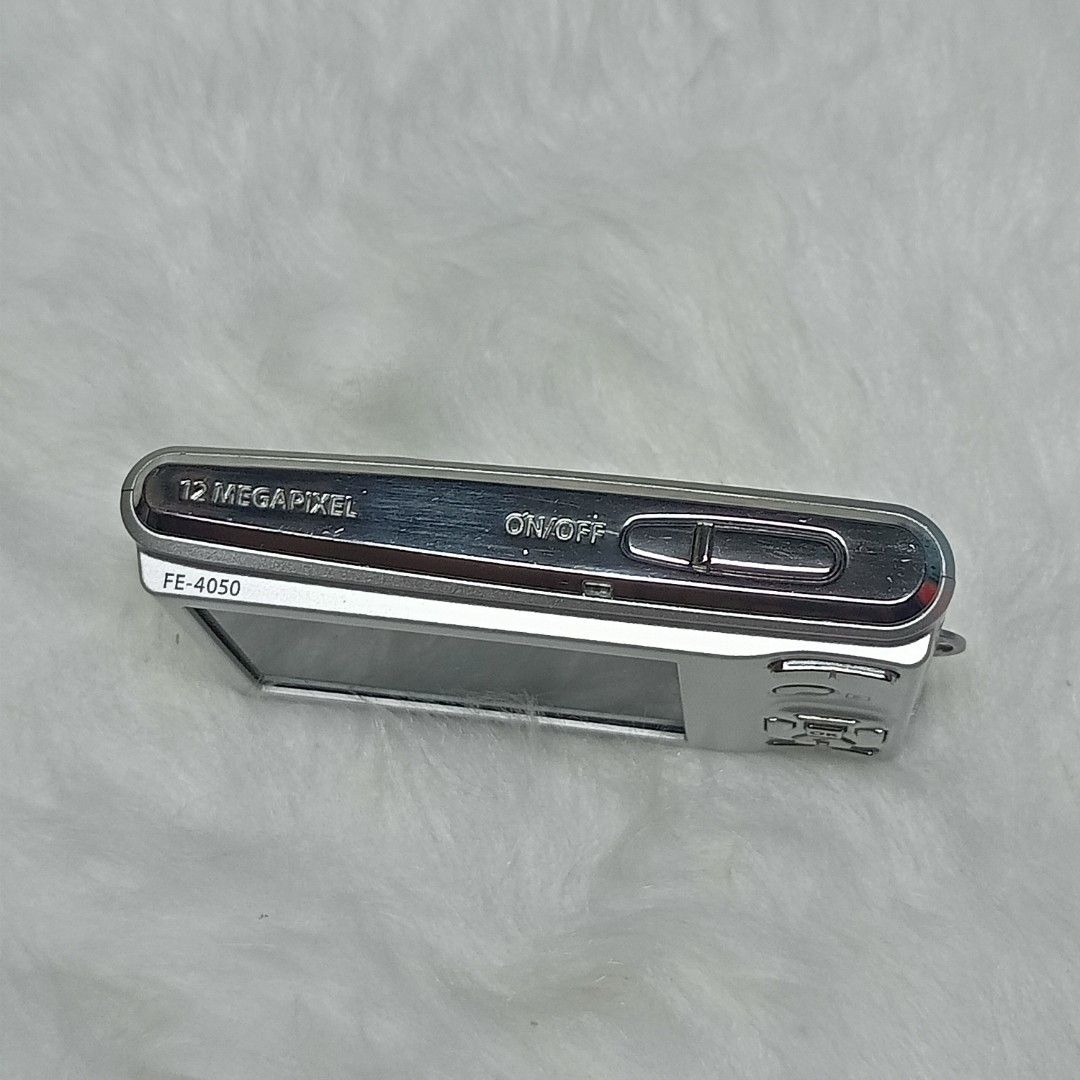 OLYMPUS Fe 4050 - Digital Camera (Category: Cameras) located in Rizal. Submitted by rowssii (Listing ID 1430519240, Image 2). Description: OLYMPUS FE-4050 price: 3,500 (slightly nego) 𝗌𝗉𝖾𝖼𝗌: ꨄ︎ 12 megapixels ꨄ︎ 4x wide optical zoom ꨄ︎ 2.7 lcd monitor ꨄ︎ fully functional — zoom, flash, video, audio & buttons are working 𝗂𝗌𝗌𝗎𝖾𝗌: ꨄ︎ screen burn — no effect on quality or performance ꨄ︎ might experience cam shutdown suddenly ꨄ︎ body conditi
