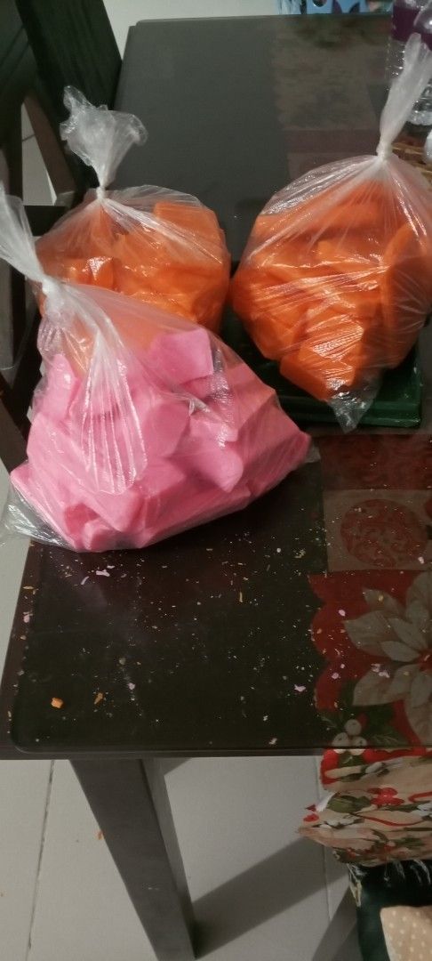 Orange and Pink Kojic-soap (Category: Bath) located in Manila. Submitted by swshop.705 (Listing ID 1430540385, Image 2). Description: Bags of orange and pink Kojic soap. The items are individually wrapped in clear plastic sold per kl. There are multiple bags of each color. The pink Kojic is strawberry milk scent...