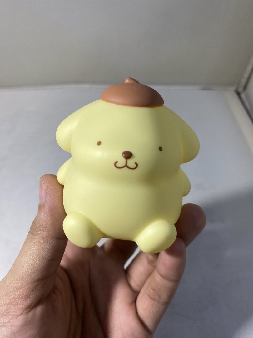 Pompompurin Figure (Category: Figurines & Statues) located in Pasacao. Submitted by wengpullar37205 (Listing ID 1430533716, Image 1). Description: Adorable Pompompurin figure is a must-have for Sanrio fans! It features Pompompurin's signature yellow color and brown beret. The figure has a cute, round design. The bottom of the figure has the copyright information. A perfect addition to any collection or a cute desk buddy..