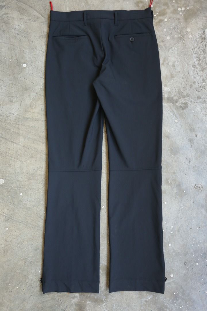 Prada Sport - Technical Trousers (Category: Trousers) located in Manila. Submitted by graymatter_ (Listing ID 1430513119, Image 2). Description: Prada Sport - Technical Trousers circa 2000s Tagged Size: 46 Condition: 9.5/10 Material: 89% Nylon, 11% Elastane Zipper: Opti Made in: Italy Dimensions Waist: 32 Inseam: 33 Crotch: 12.5 Thigh: 11 Leg Opening: 8.75 .