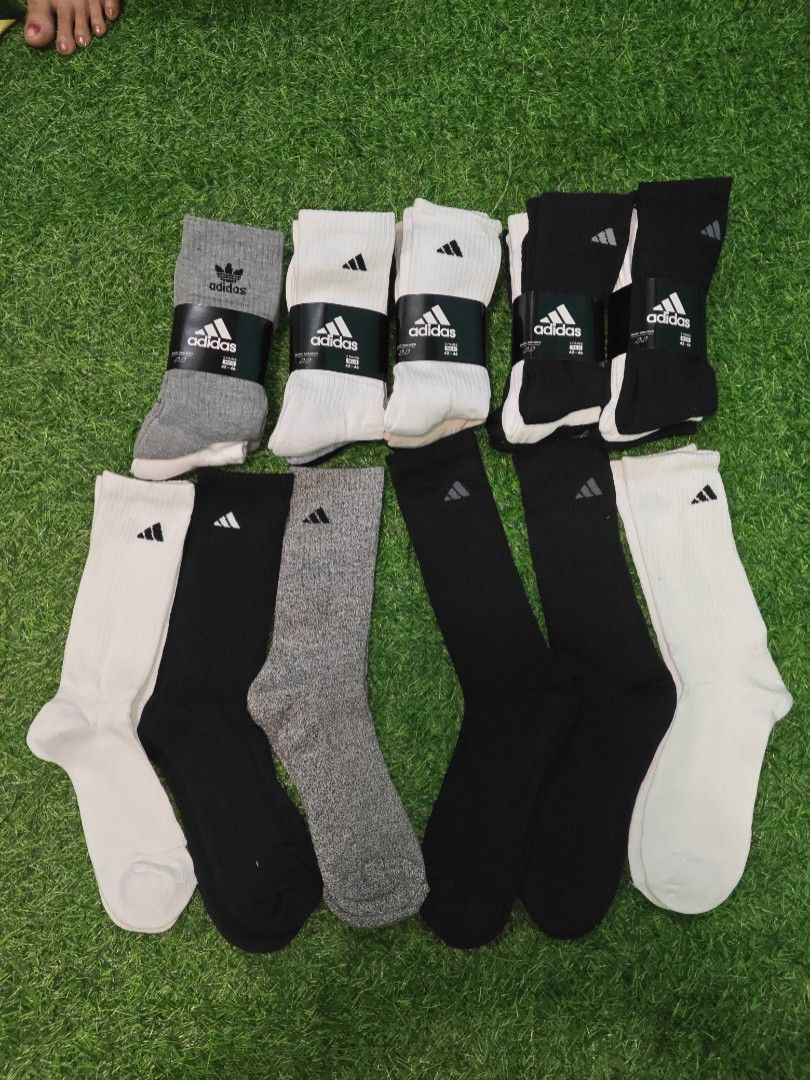 Puma and Adidas Socks (Category: Socks) located in Caloocan City. Submitted by hazelleeno29786 (Listing ID 1430447970, Image 2). Description: Socks from Puma and Adidas. Available in various colors and styles. Some are crew socks, and some are low-cut sneaker socks. Adidas socks come in packs of three pairs. Sizes available are 42-46 and 39-46. Perfect for everyday wear or sports activities..
