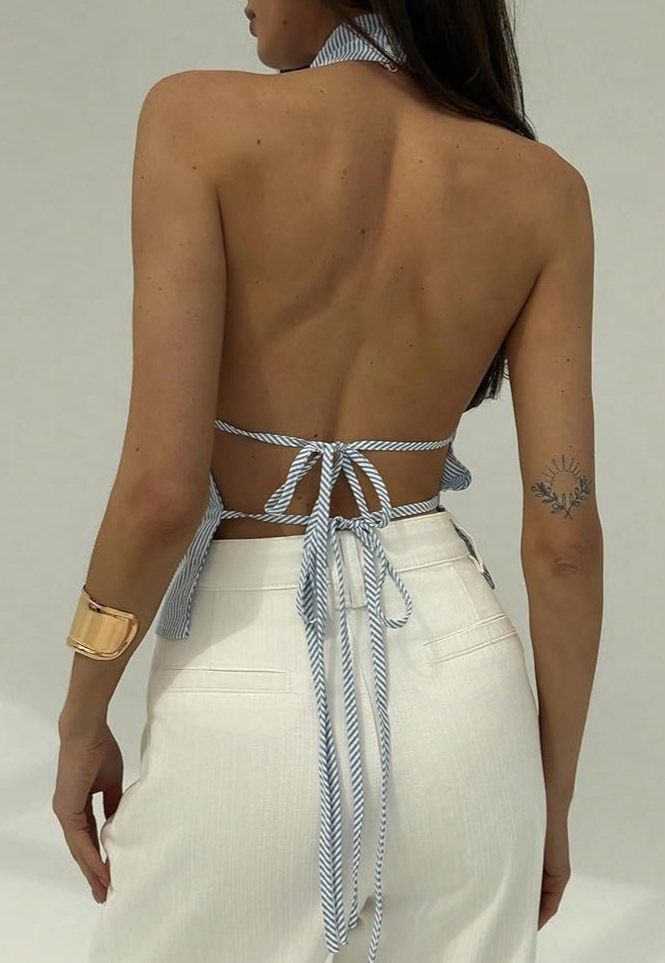 Shein striped blue Halter Top vacation (Category: Sleeveless) located in Cebu City. Submitted by fevercollector (Listing ID 1430423510, Image 2). Description: - Shein striped blue halter top - Size XS - Stylish halter neck design - Open back - Ideal for vacation or everyday wear.