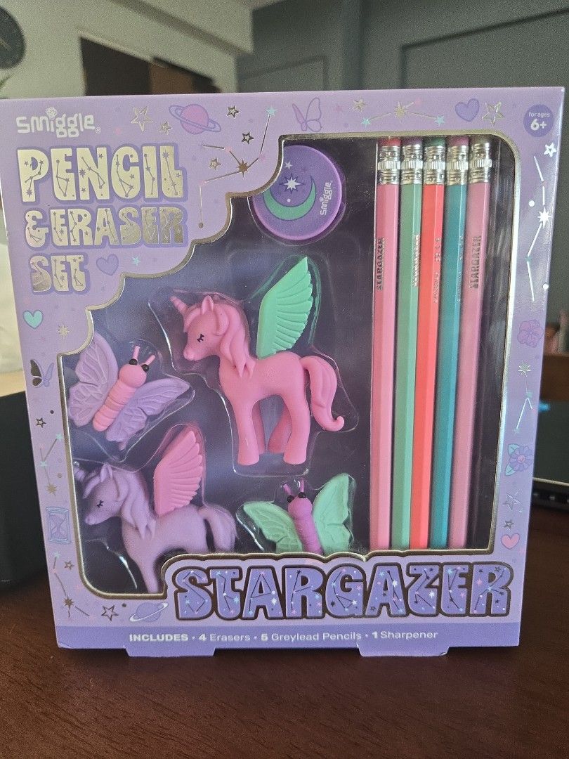 Smiggle Stargazer Pencil & Eraser Set (Category: Stationery & School Supplies) located in Singapore. Submitted by van.eee (Listing ID 1430484112, Image 1). Description: Brand new Smiggle Stargazer pencil and eraser set. Includes 5 grey lead pencils, 4 erasers, and 1 sharpener. Perfect for school or as a gift. Features a cute design with unicorns and butterflies..