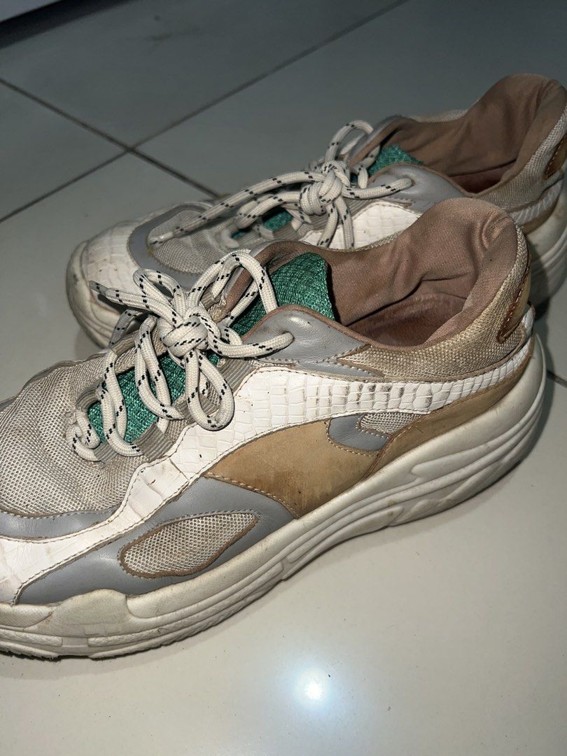 Staccato White and Beige Sneakers (Category: Sneakers) located in Manila. Submitted by twiicee (Listing ID 1430578637, Image 3). Description: White and beige sneakers with mesh upper, chunky sole, and green accents..
