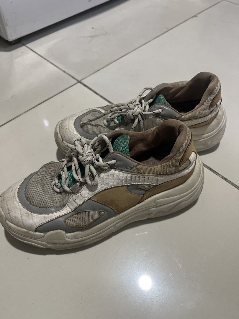 Staccato White and Beige Sneakers (Category: Sneakers) located in Manila. Submitted by twiicee (Listing ID 1430578637, Image 2). Description: White and beige sneakers with mesh upper, chunky sole, and green accents..