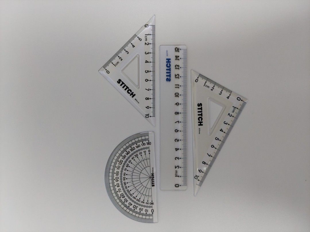 Stitch Ruler Set (Category: Stationery & School Supplies) located in Quezon City. Submitted by robyns.closet.ph (Listing ID 1430468941, Image 3). Description: Stitch ruler set includes a protractor, two triangles, and a ruler. The set comes in a light blue case with Stitch graphics. The rulers are transparent with black markings. The set is ideal for school or office use..