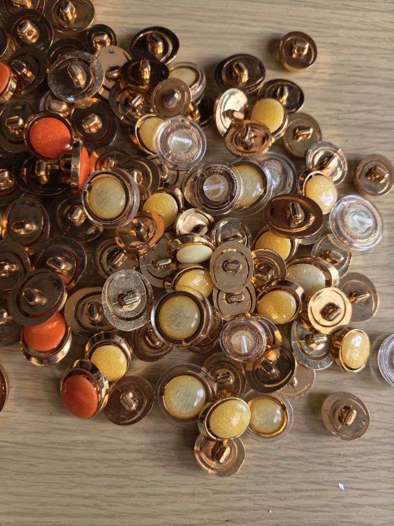 Take All 200 Assorted Buttons - Various Colors and Styles (Category: Craft Supplies & Tools) located in Rizal. Submitted by gkstcenit (Listing ID 1430401971, Image 1). Description: Large assortment of buttons in various colors, shapes, and sizes. Includes gold-toned buttons with clear and colored centers, as well as colorful plastic buttons in red, green, pink, blue, and more. Perfect for sewing, crafts, or adding a unique touch to your projects.
