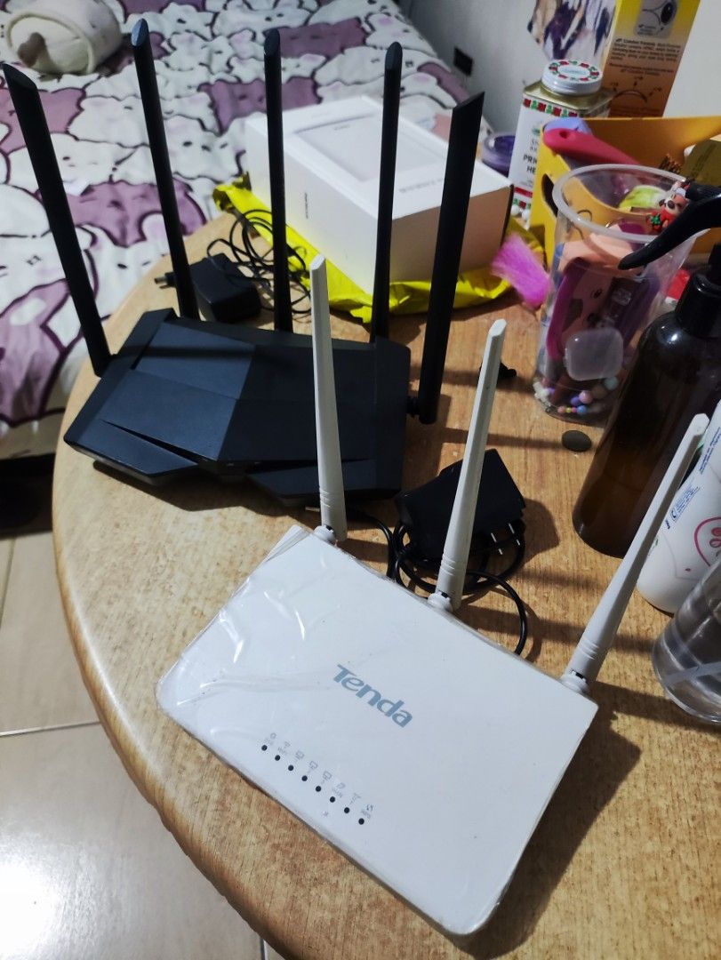 Tenda AC11 v2 & Wireless N300 Router (Category: Networking) located in Baliuag. Submitted by vernede.guzman (Listing ID 1430524975, Image 2). Description: Pair of Tenda AC1200 AC11 (dual band) & Tenda Wireless N300 WiFi Router. RFS: Upgraded..