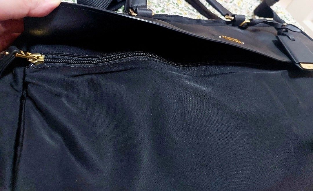 Tumi Black Briefcase with Shoulder Strap (Category: Briefcases) located in Manila. Submitted by gflo72345 (Listing ID 1430561285, Image 2). Description: can fit 15in laptop authentic generic strap only good condition! minor scratches on leather with small ink blots in interior pocket.