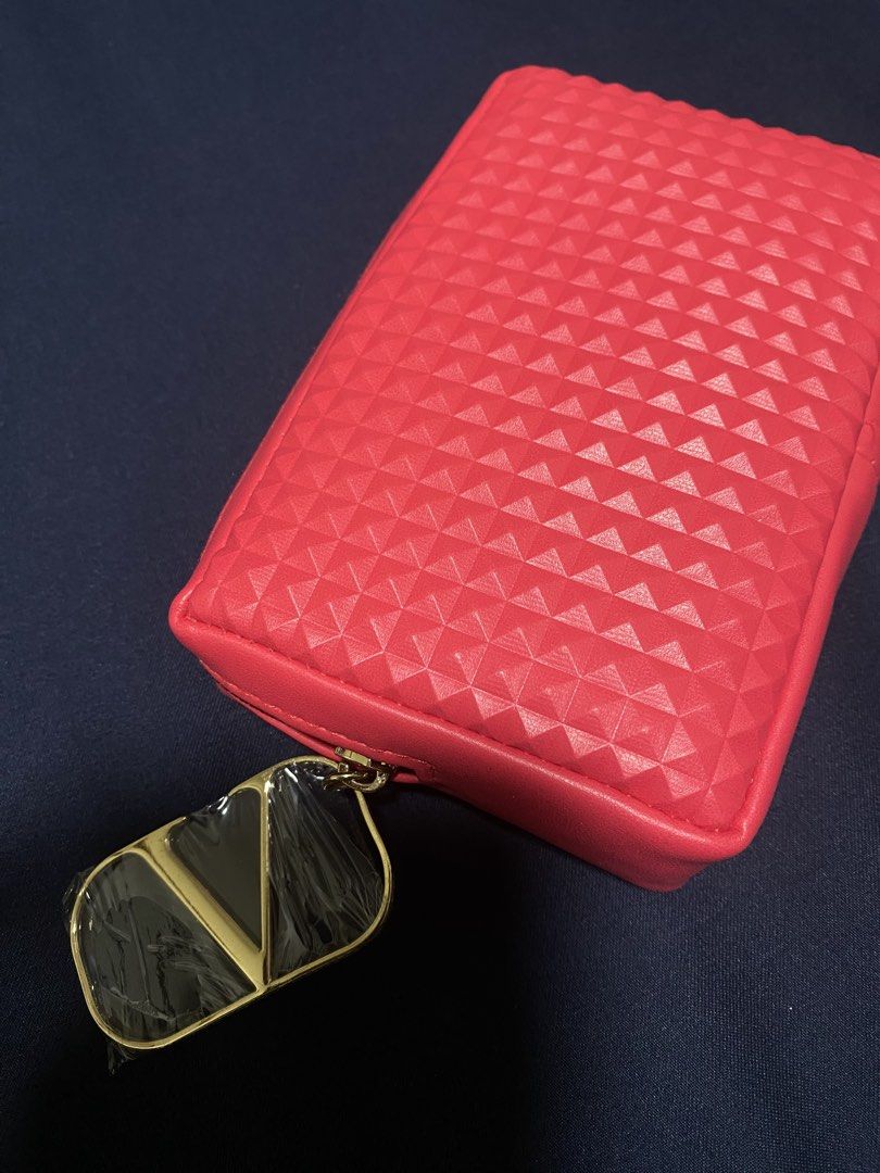 Valentino Studded Makeup Pouch (Category: Luxury Bags & Wallets) located in Quezon City. Submitted by lizzieloco (Listing ID 1430463543, Image 1). Description: Authentic from the US Valentino - hot pink Never used .
