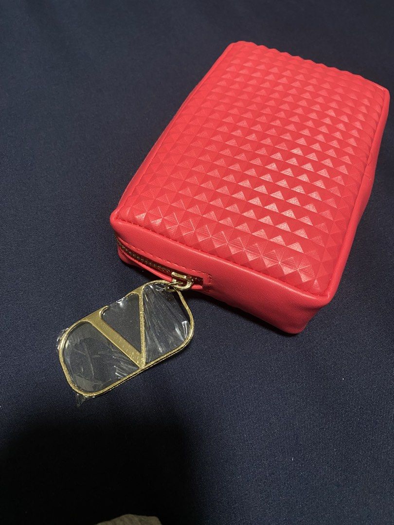 Valentino Studded Makeup Pouch (Category: Luxury Bags & Wallets) located in Quezon City. Submitted by lizzieloco (Listing ID 1430463543, Image 2). Description: Authentic from the US Valentino - hot pink Never used .