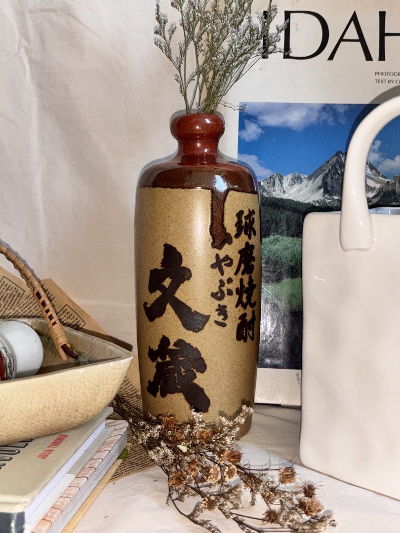 Vintage Japanese Ceramic Vase (Category: Vases & Decorative Bowls) located in Manila. Submitted by jullialm (Listing ID 1430577183, Image 2). Description: With sticker Very nice in actual, atleast 9in height * Send DM or message to Mine * Please manage your expectations. Note that these are vintage items that may show signs of usage which is part of their story as well. Any flaw will be disclosed and all items posted are as is. * Strictly no dele