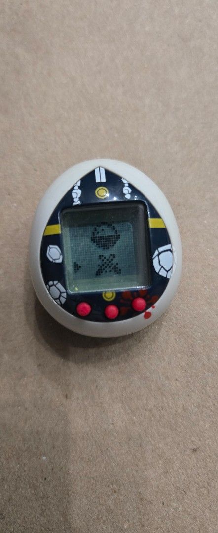 Vintage Virtual Pet Game (Category: Interactive Toys) located in Angeles City. Submitted by dericklumanog (Listing ID 1430566005, Image 3). Description: Demon Slayer: Kimetsu no Yaiba Nano Tamagotchi, Tengen Uzui version P550 Working well. .