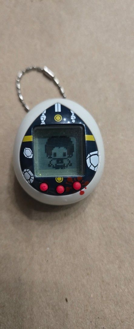 Vintage Virtual Pet Game (Category: Interactive Toys) located in Angeles City. Submitted by dericklumanog (Listing ID 1430566005, Image 2). Description: Demon Slayer: Kimetsu no Yaiba Nano Tamagotchi, Tengen Uzui version P550 Working well. .