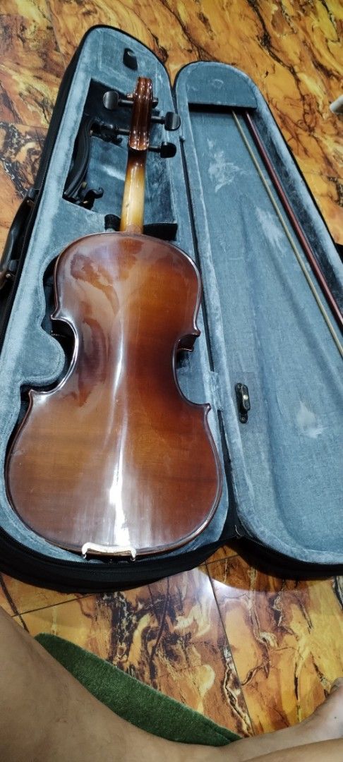 Violin with Case and Bow (Category: Musical Instruments) located in Caloocan City. Submitted by rowely_jpn (Listing ID 1430512481, Image 3). Description: Violin comes with a case and bow. The violin has strings and a bridge. The case is lined with a gray material. The bow is included.3/4 size ...