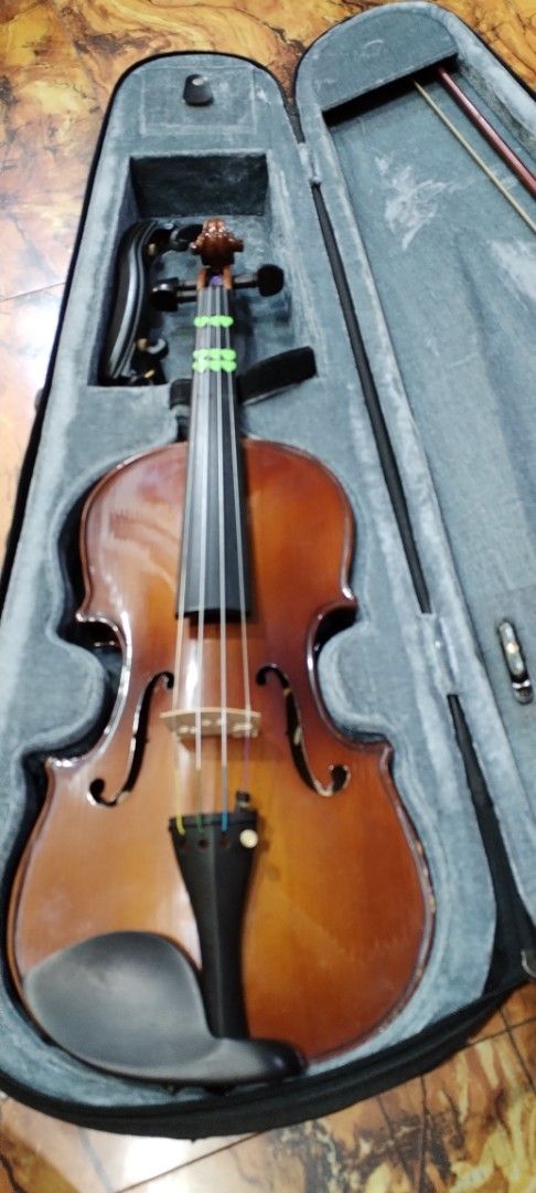 Violin with Case and Bow (Category: Musical Instruments) located in Caloocan City. Submitted by rowely_jpn (Listing ID 1430512481, Image 2). Description: Violin comes with a case and bow. The violin has strings and a bridge. The case is lined with a gray material. The bow is included.3/4 size ...