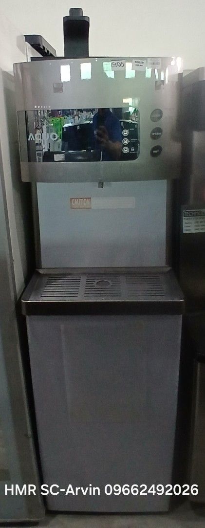 Water Dispenser Used 220V (Category: Other Kitchenware & Tableware) located in Manila. Submitted by sc_arvin (Listing ID 1430447191, Image 1). Description: Commercial ice machine. Features a stainless steel exterior. Includes a dispensing area and a storage bin. The machine has a control panel with buttons. Contact HMR SC-Arvin at 09662492026 for inquiries..