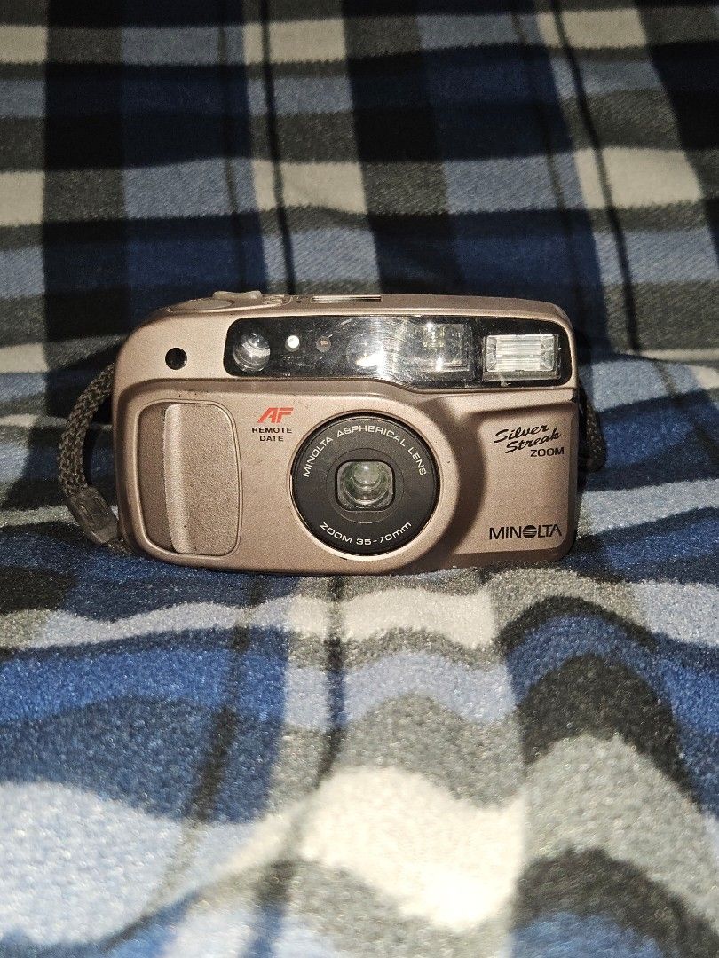 Working Film Cameras for sale (Category: Cameras) located in Manila. Submitted by shindae17 (Listing ID 1430521618, Image 2). Description: Three vintage point-and-shoot cameras are available. The first is a Fujifilm Endeavor 250 Zoom. The second is a Minolta with a 38-70mm lens. The third is a Pentax Espio 738S. All cameras have a built-in flash. They are compact and suitable for casual photography. Pm for more details(vid and price).