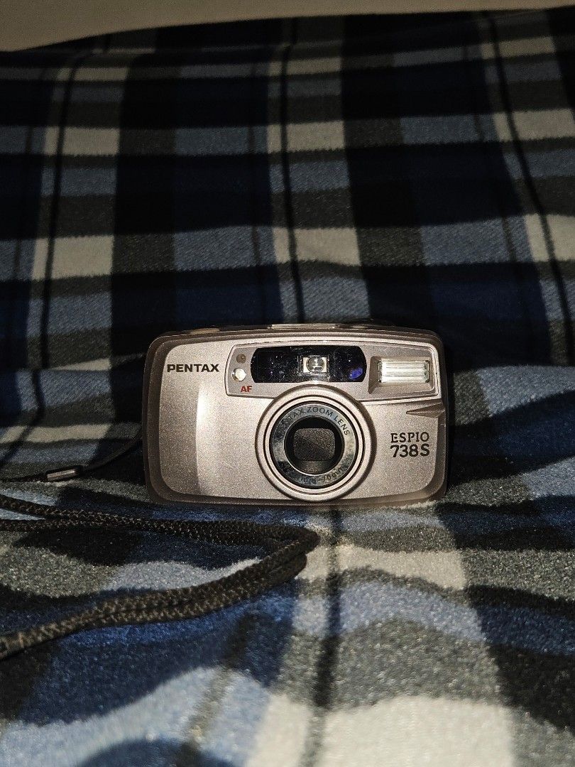 Working Film Cameras for sale (Category: Cameras) located in Manila. Submitted by shindae17 (Listing ID 1430521618, Image 3). Description: Three vintage point-and-shoot cameras are available. The first is a Fujifilm Endeavor 250 Zoom. The second is a Minolta with a 38-70mm lens. The third is a Pentax Espio 738S. All cameras have a built-in flash. They are compact and suitable for casual photography. Pm for more details(vid and price).