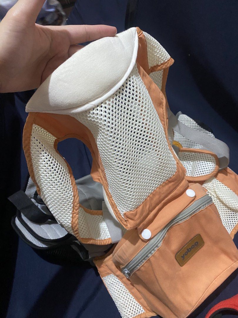 Yoboo Baby Carrier Set and Walking Support (Category: Carriers & Slings) located in San Narciso. Submitted by boypablo1998 (Listing ID 1430565791, Image 2). Description: Yoboo baby carrier features a breathable mesh design for comfort. It has a zippered pocket for small items and adjustable straps. It is designed to securely hold your baby while allowing you to keep your hands free..